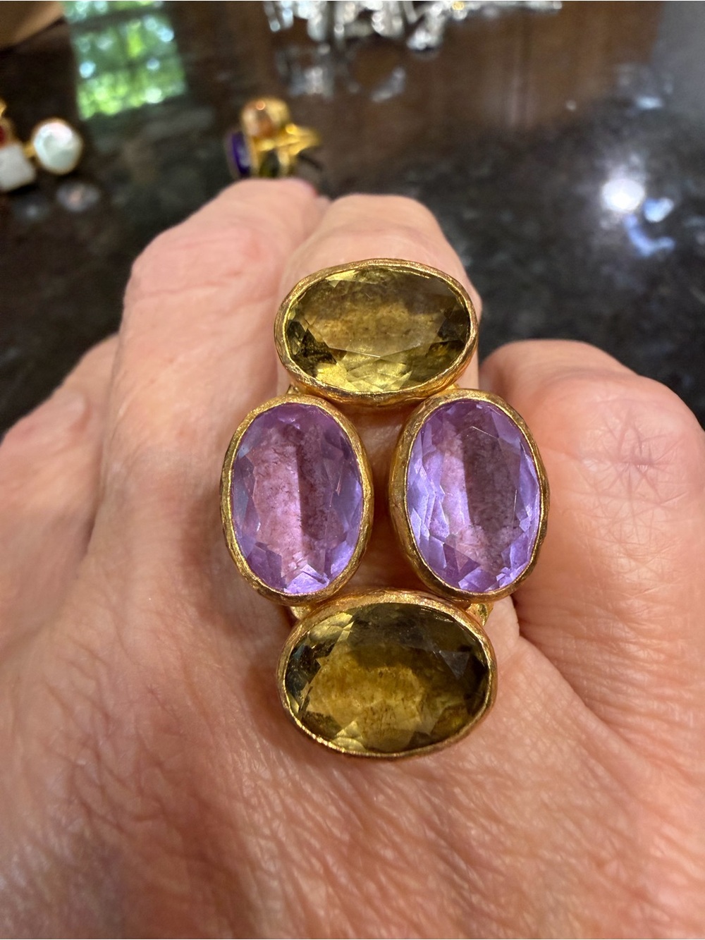 Gold-Tone Statement Ring with Purple and Green Stones